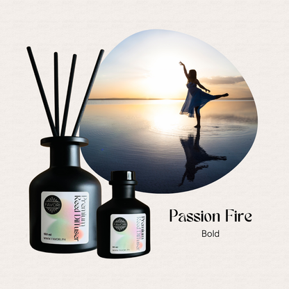 Two FAVORI Scents Passion Fire Premium Reed Diffusers glow at sunset as a woman dances; text: Passion Fire Bold.