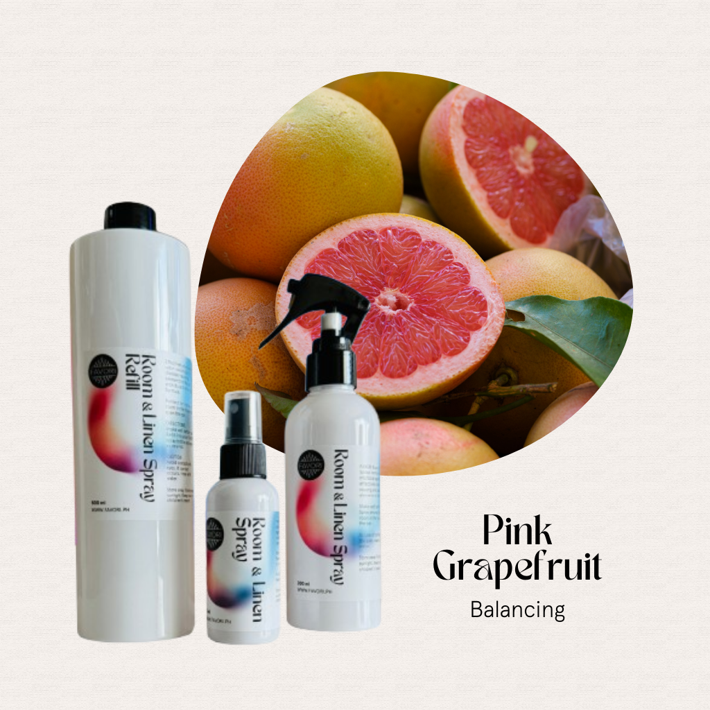 Three FAVORI Scents Trio – Regular Room & Linen Air Sprays with fresh pink grapefruits in the background.