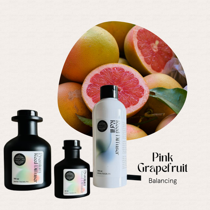 Three black bottles and a white bottle of FAVORI Scents Pink Grapefruit Trio Premium Reed Diffuser (TPRD).