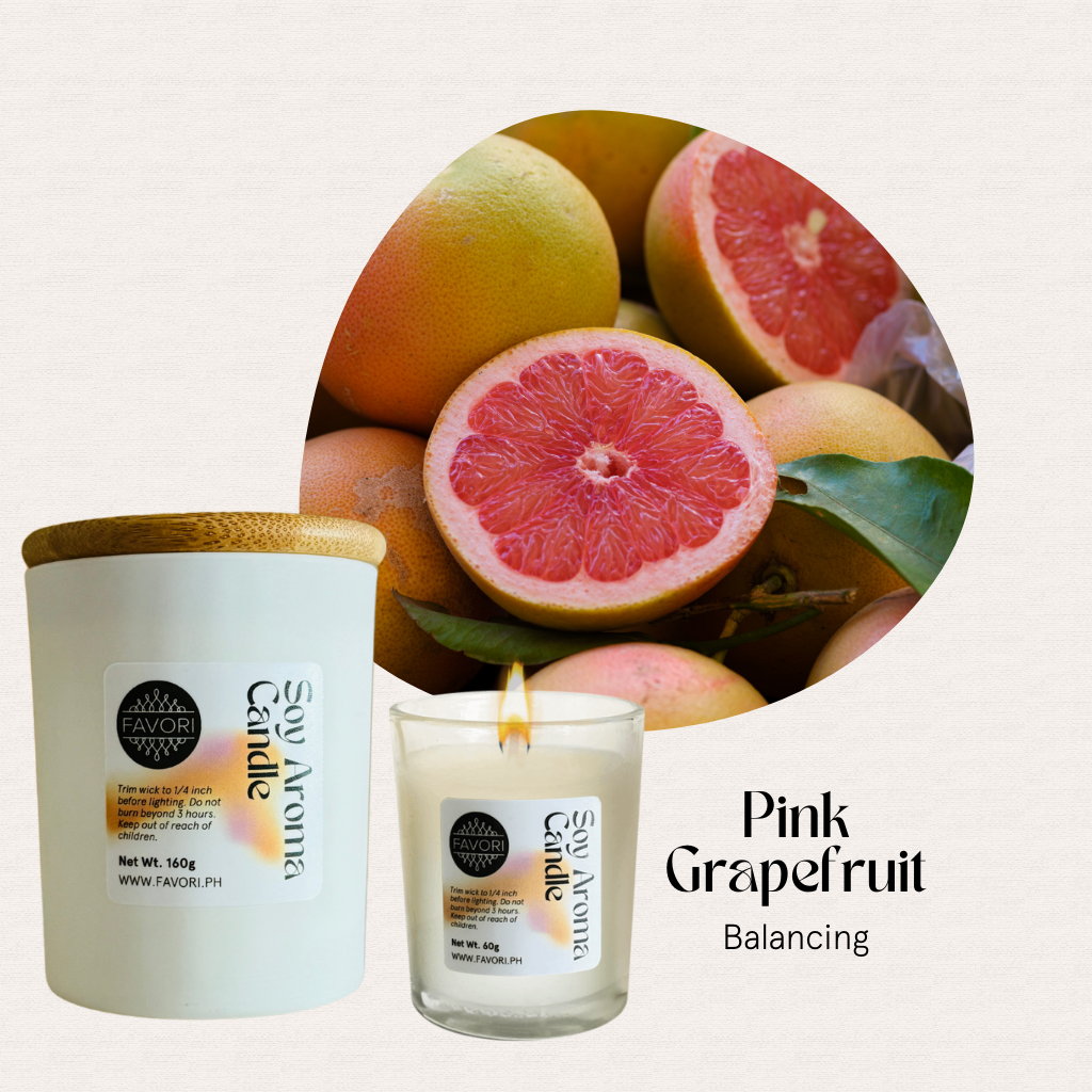 FAVORI Scents All Occasion eco-friendly candles, Pink Grapefruit Balancing, with pink grapefruit halves in front.