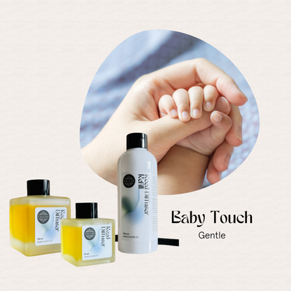 A baby grasps an adult finger; below, FAVORI Scents Baby Touch Trio Reed Diffuser in baby powder scent.