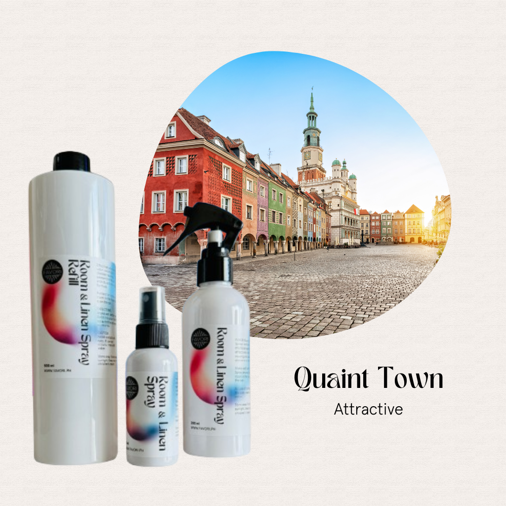 Three FAVORI Scents Trio Air Spray bottles for odor removal in front of a colorful European town square.