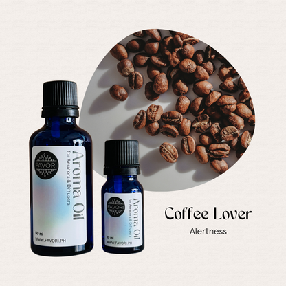 Two blue FAVORI Scents Aerator/Diffuser Aroma Oils labeled Coffee Lover beside coffee beans.