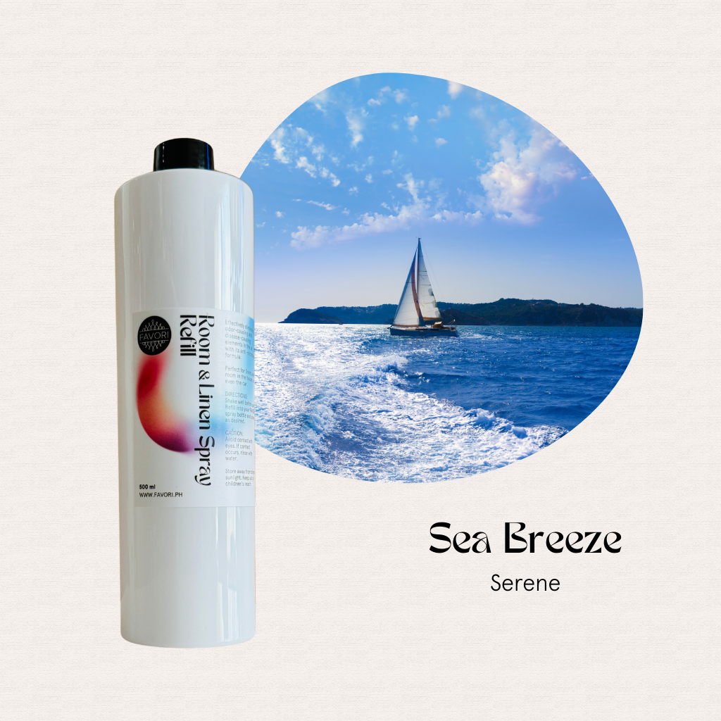 A FAVORI Scents Refill – Regular Room & Linen Air Spray 500ml beside a sailboat photo, Sea Breeze Serene.