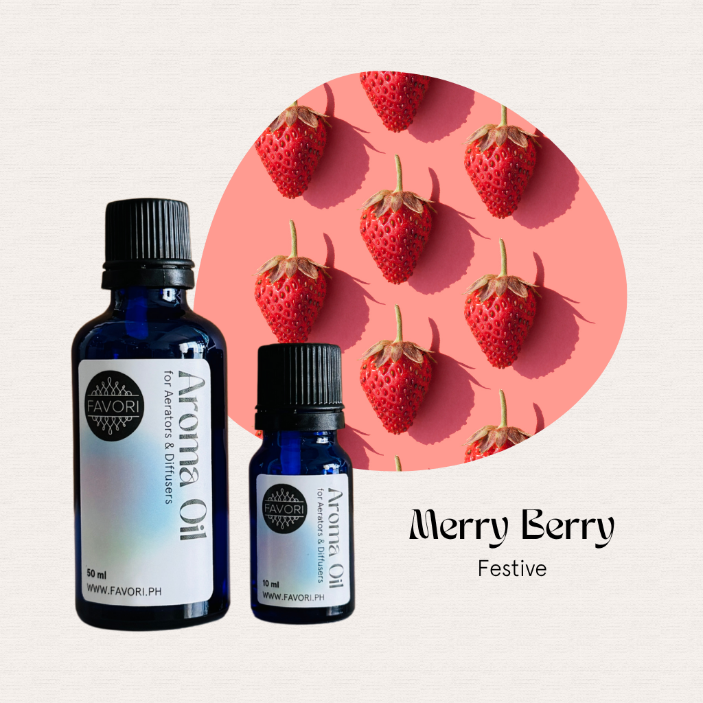 Two blue FAVORI Scents AD Aroma Oils in front of strawberries; text: Merry Berry Festive.