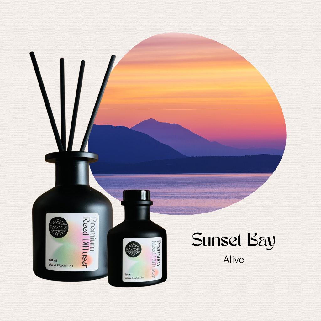 Two FAVORI Scents Sunset Bay Premium Reed Diffusers in front of a bay scene; text: Sunset Bay Alive.