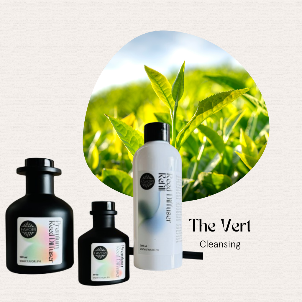 Three FAVORI Scents The Vert Trio Reed Diffusers among tea leaves, showcasing anti-microbial cleansing.