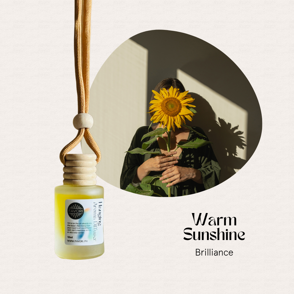 A pendant bottle and person with sunflower, plus text: FAVORI Scents Hanging Aroma Diffusers—freshness to go.