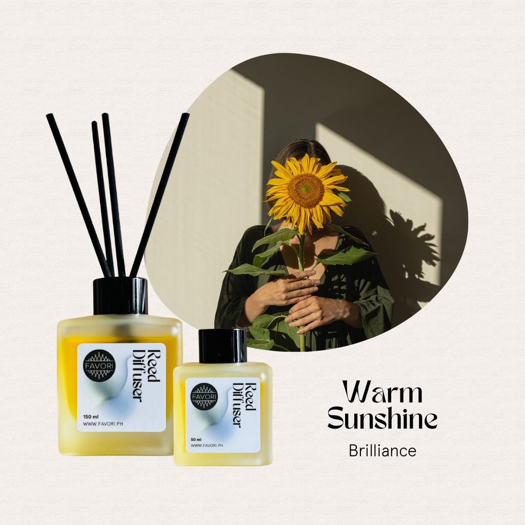 Two FAVORI Scents Warm Sunshine RRDs sit in front of a woman holding a sunflower.