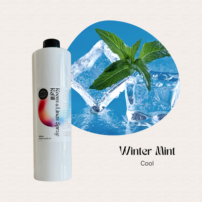 A white FAVORI Scents Refill – Regular Room & Linen Air Spray 500ml, Winter Mint Cool, with mint leaves and ice.