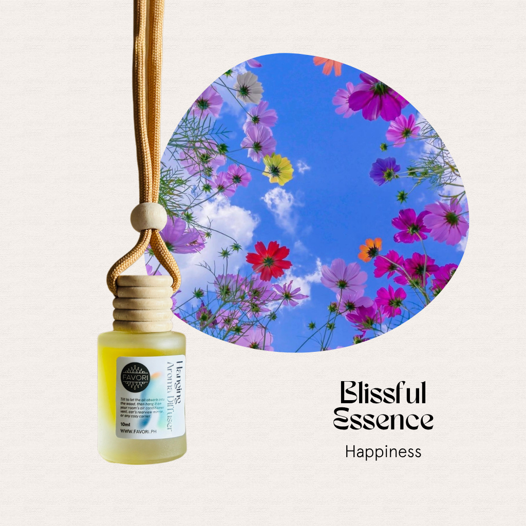 FAVORI Scents Hanging Aroma Diffuser with floral label beside flowers; text: Blissful Essence Happiness.