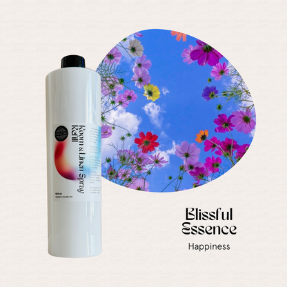Tall white FAVORI Scents 500ml Air Spray beside flowers, text reads Refill – Regular Room & Linen Air Spray.