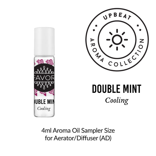 Small bottle of "Double Mint Aroma Oil Sampler" from the FAVORI Scents upbeat diffuser collection, labeled 4ml in size, with a pink and white tribal design.