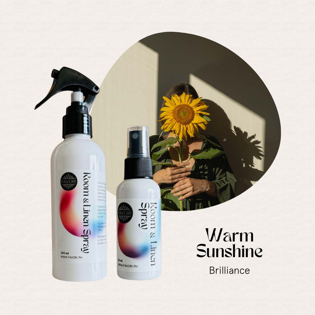 Two FAVORI Scents Regular Room & Linen Air Sprays; text: Warm Sunshine Brilliance mood enhancer.