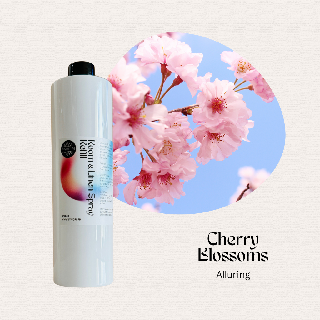A FAVORI Scents Refill – Regular Room & Linen Air Spray 500ml, Cherry Blossoms Alluring, on a blue sky.