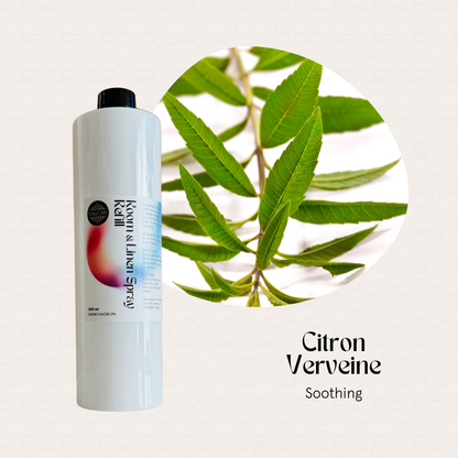 A white FAVORI Scents Air Spray Refill 500ml rests by citron verbena; labeled Citron Verveine, Odor Eliminator.