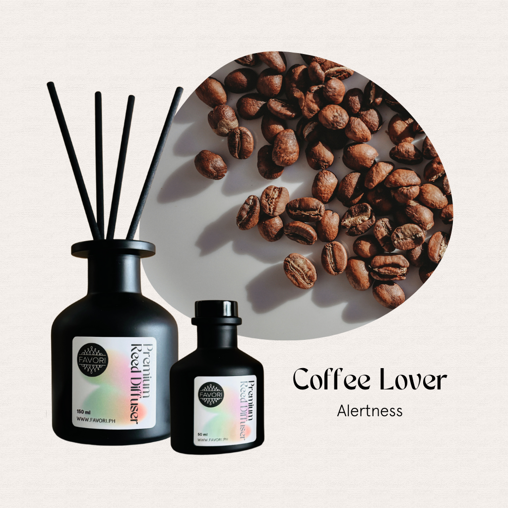 Two FAVORI Scents Coffee Lover Premium Reed Diffusers with fiber sticks and scattered coffee beans.
