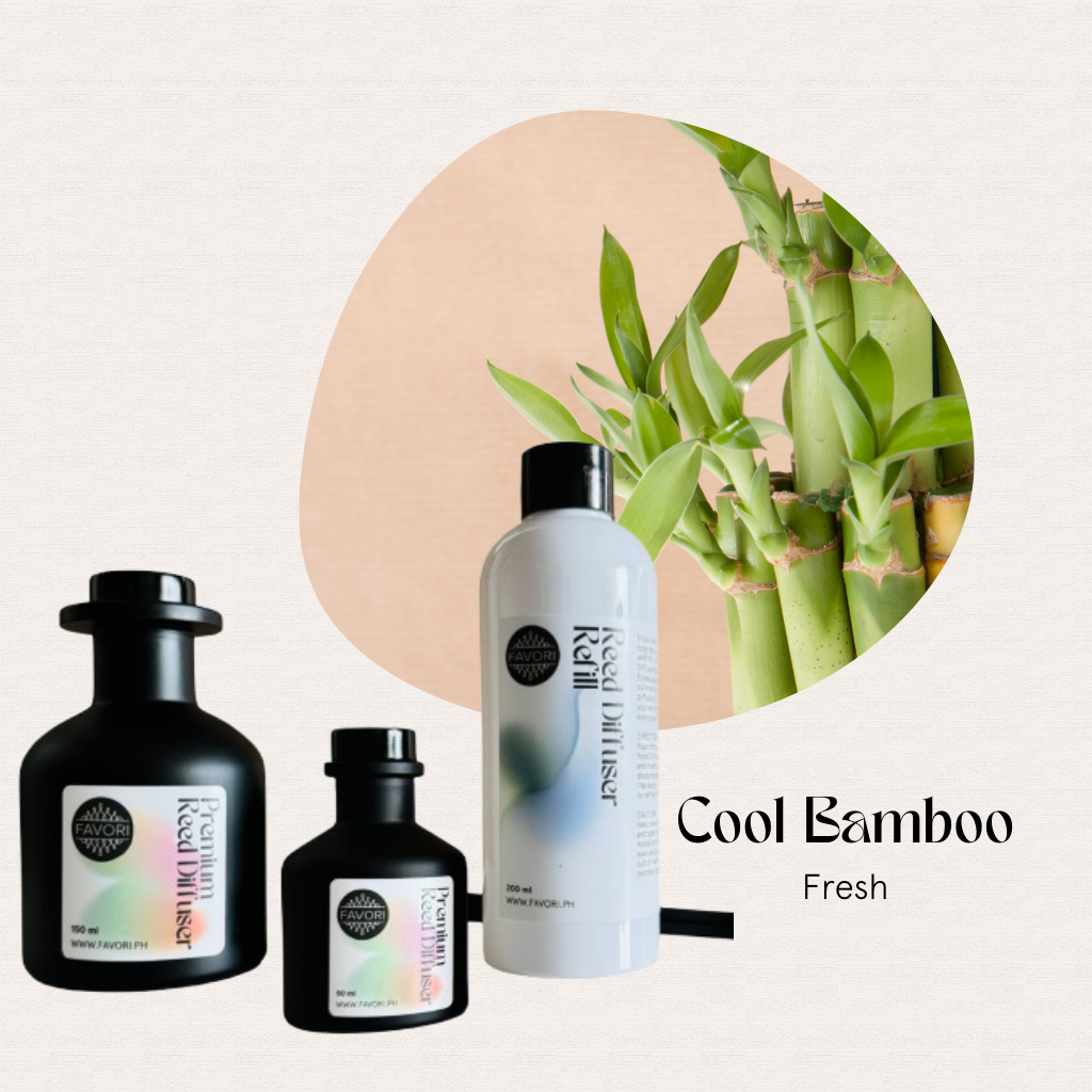 Three FAVORI Scents Cool Bamboo Trio Premium Reed Diffusers beside a bamboo plant on a beige background.