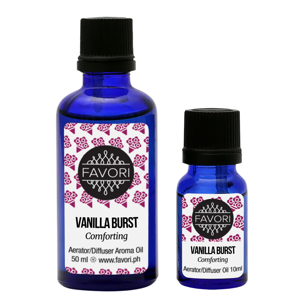 Two blue bottles of FAVORI Scents Vanilla Burst Aerator/Diffuser (AD) Aroma Oil are displayed; the larger bottle is 50 ml and the smaller one is 10 ml. Both have black caps and labels featuring the brand name, product name, and a red rose pattern on a white background. This water-soluble oil enhances any diffuser experience.