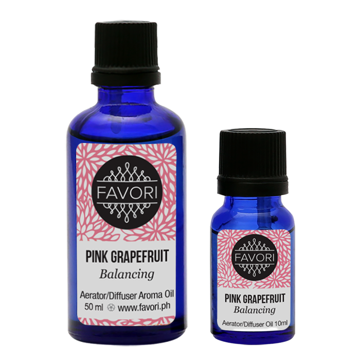 Two bottles of FAVORI Scents Pink Grapefruit Aerator/Diffuser (AD) aroma oil, one large and one small, against a white background.