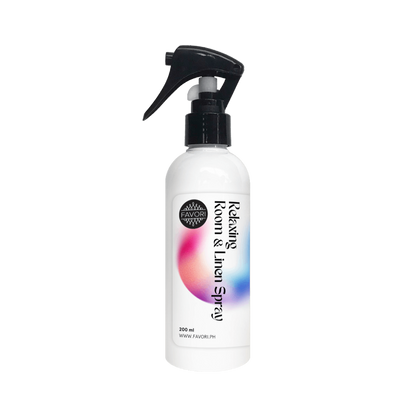 FAVORI Scents Relaxing Room & Linen Air Spray (AS), a mood-enhancing spray with colorful abstract design.
