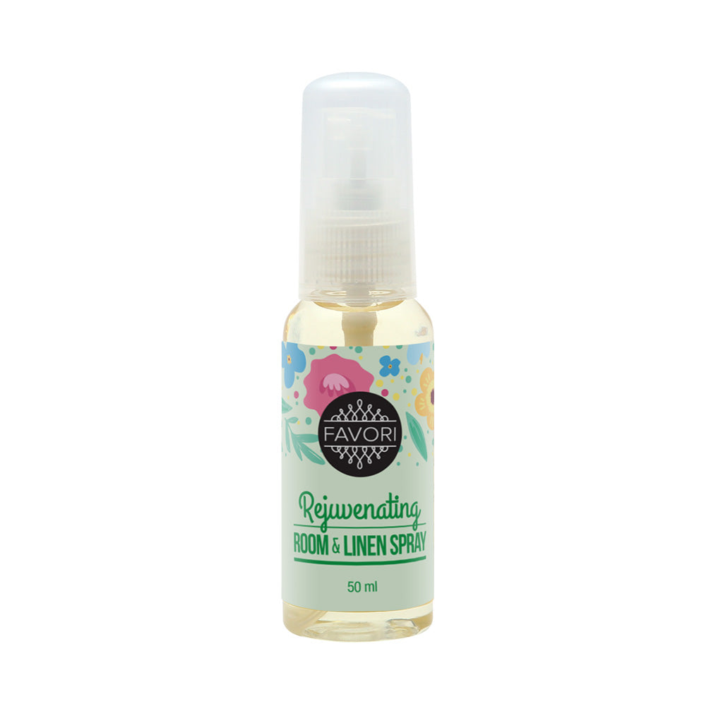 A 50 ml bottle of FAVORI Scents Rejuvenating Room & Linen Air Spray with favori oil.