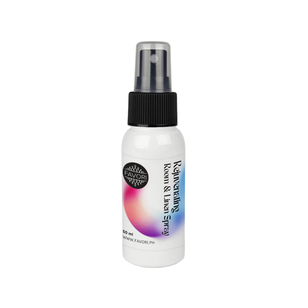 A white FAVORI Scents Rejuvenating Room & Linen Air Spray (AS) bottle with a black cap on a plain background.
