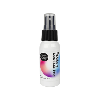 A white FAVORI Scents Revitalizing Room & Linen Air Spray (AS) bottle with black cap and gradient design.