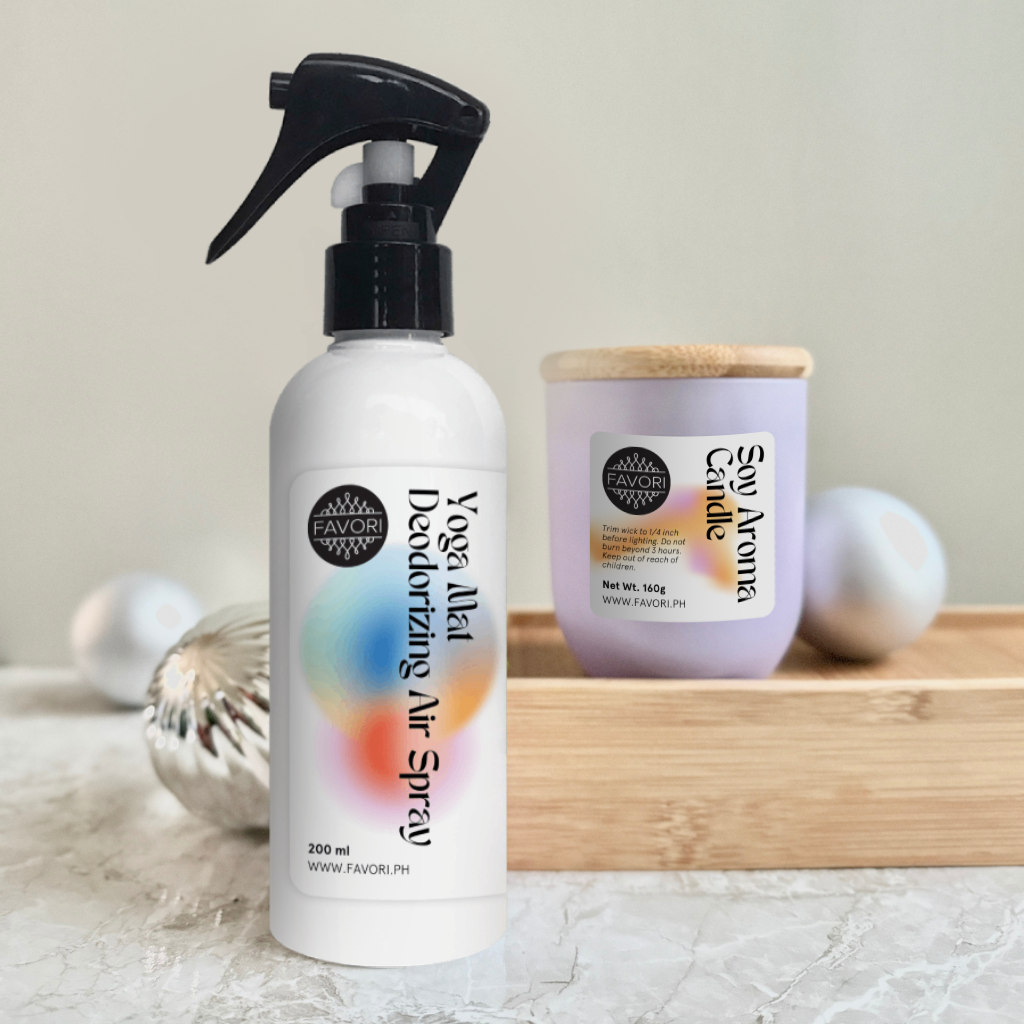The FAVORI Scents Air Spray (200ml) and Soy Aroma Candle (160g) sit together on a wooden tray.