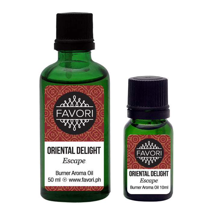 Two bottles of FAVORI Scents Oriental Delight Burner Aroma Oil in different sizes.