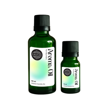 Two green FAVORI Scents Burner Aroma Oils (50ml & 10ml) bottles on a white background.