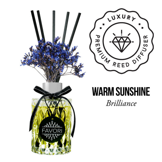 Rephrase: The FAVORI Scents Warm Sunshine Premium Reed Diffuser (PRD) with a bouquet of dried lavender and black reed sticks, filled with favori oil.