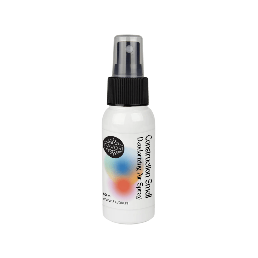 White FAVORI Scents Contruction Deodorizing Air Spray (AS), with black cap and gradient label, odor neutralizer.
