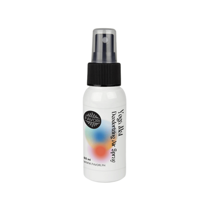 A white bottle of FAVORI Scents Yoga Mat Deodorizing Air Spray (AS) with a black cap and colorful label.