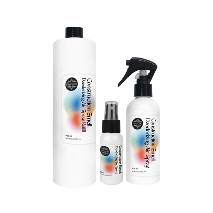 Three white FAVORI Scents Contruction Deodorizing Air Spray bottles in assorted sizes with vibrant labels.