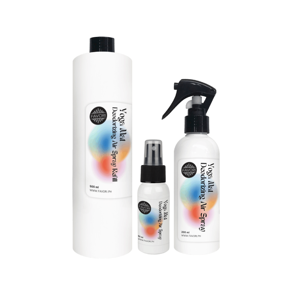 Three white FAVORI Scents Yoga Mat Deodorizing Air Spray bottles with colorful labels for odor-fresh mats.