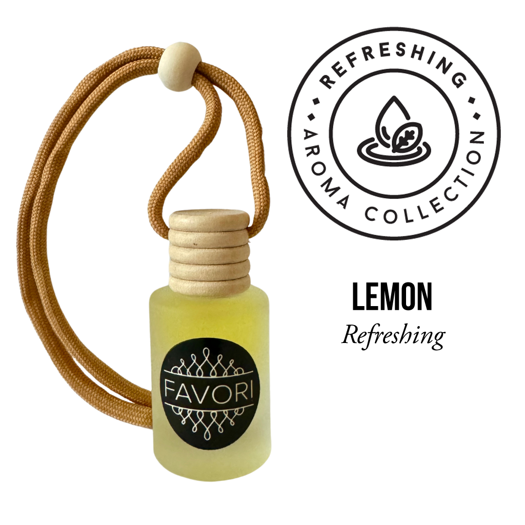 A small bottle labeled "FAVORI Scents" filled with yellow liquid and topped with a wooden cap, attached to a tan-colored rope handle. To the right, there is a circular logo stating "Refreshing Aroma Collection" with a leaf and water droplet icon. Below, the text reads "Lemon Hanging Aroma Diffuser (HAD)." This compact diffuser ensures a portable fragrance and lasting aroma wherever you go.