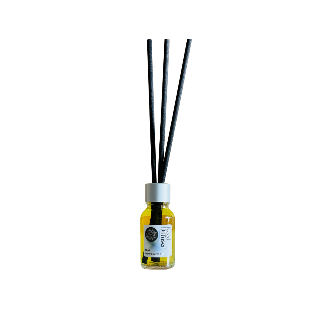 FAVORI Scents Mini Reed Diffusers (MRD) with yellow liquid and 3 black fiber sticks on a white background.