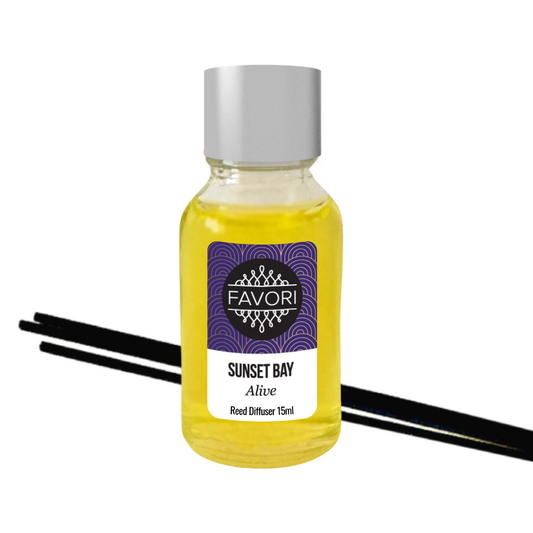 A "Sunset Bay Mini Reed Diffuser" by FAVORI Scents with a purple and white label, accompanied by black fiber reed sticks.