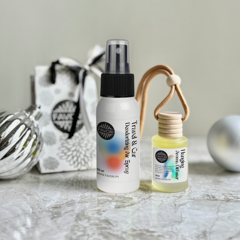 FAVORI Scents Petit Gift Package with air spray, mini diffuser, gift bag & silver ornament on marble.
