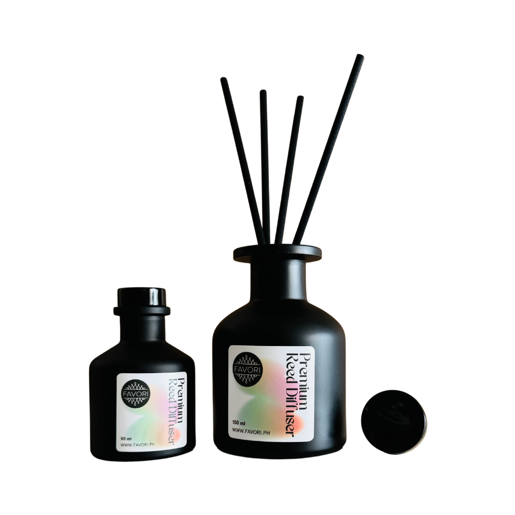 Two FAVORI Scents PRD bottles with anti-microbial reeds and pastel labels on a white background.