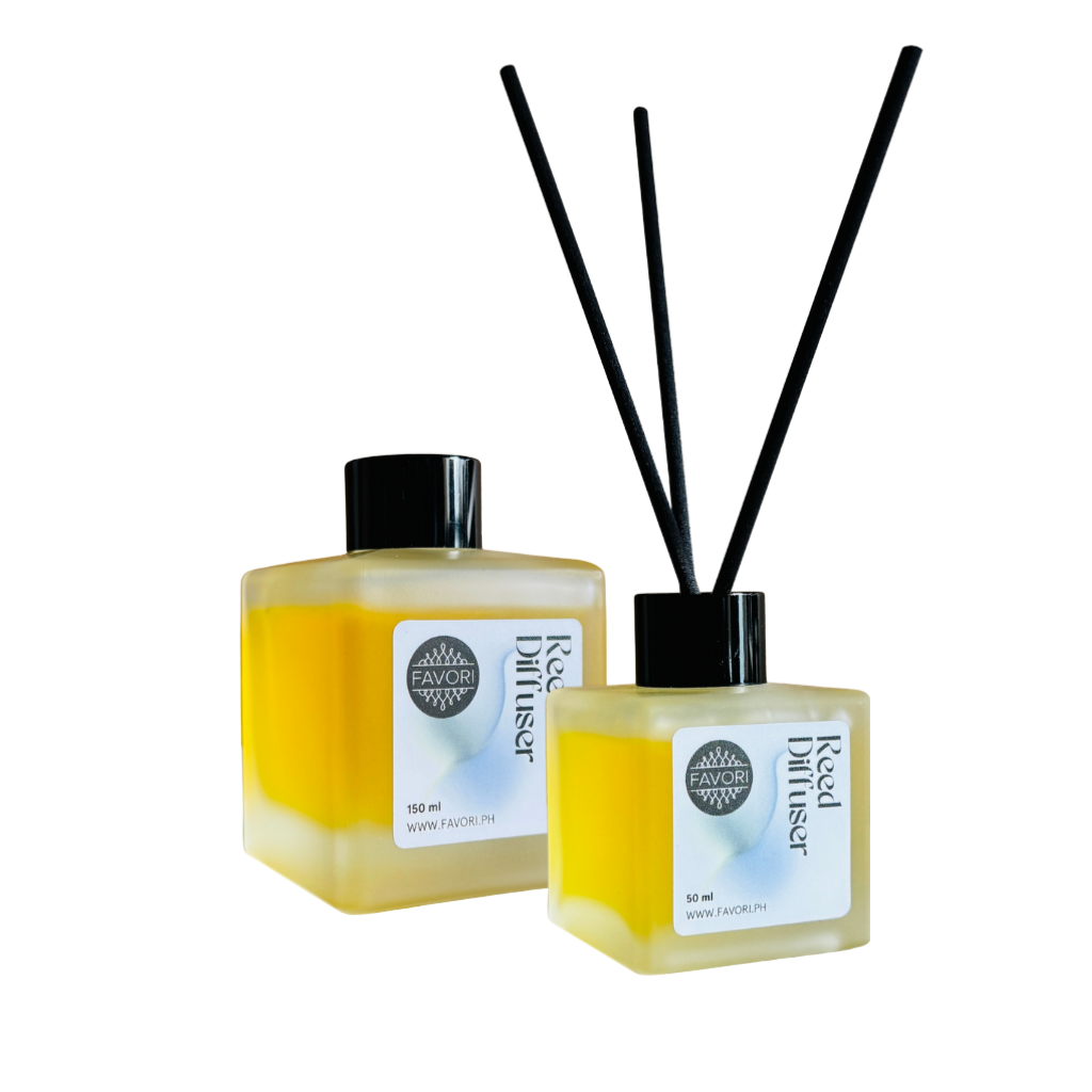 Two FAVORI Scents Reed Diffusers (RD) with black fiber reeds and caps on a white background.