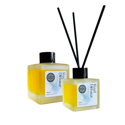 Two FAVORI Scents Reed Diffusers (RD) with black fiber reeds and caps on a white background.