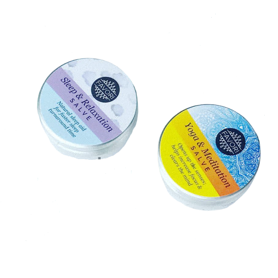 Two FAVORI Scents Wellness Salve tins placed on a white background.